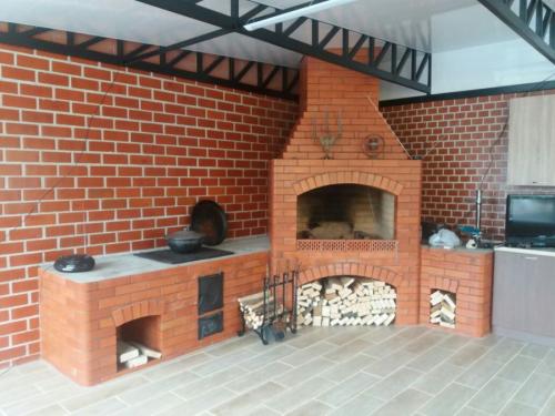 Уличные барбекю из кирпича. Мангал из кирпича: чертежи, фото, видео. Инструкция, как сделать простой мангал на участке?