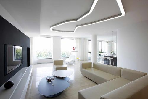 Дизайн гостиной в частном доме минимализм. Гостиная в стиле минимализм: основные черты