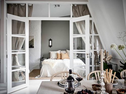 Мансардная квартира с великолепными арочными окнами 18