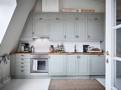 Мансардная квартира с великолепными арочными окнами 16