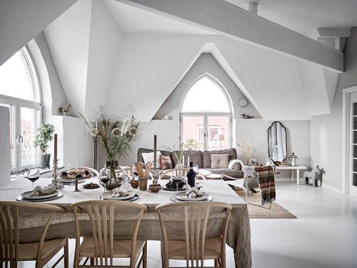 Мансардная квартира с великолепными арочными окнами 21