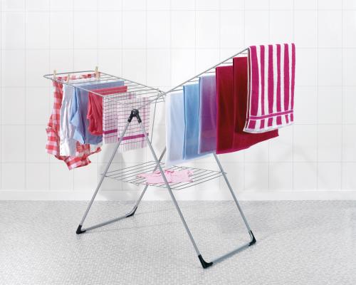 Где сушить белье в квартире красиво? [5 нестандартных решений]