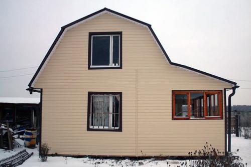 Отделка фронтонов частных домов. Дешевые материалы для обшивки