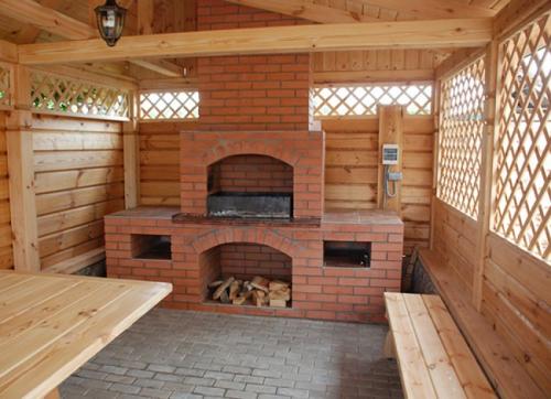 Проекты дачных беседок с мангалом. Особенности беседки с мангалом