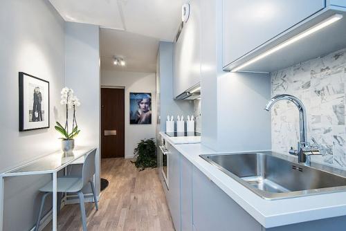 Функциональный дизайн однокомнатной квартиры площадью 25 кв. м 04