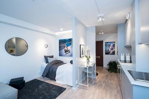 Функциональный дизайн однокомнатной квартиры площадью 25 кв. м 05