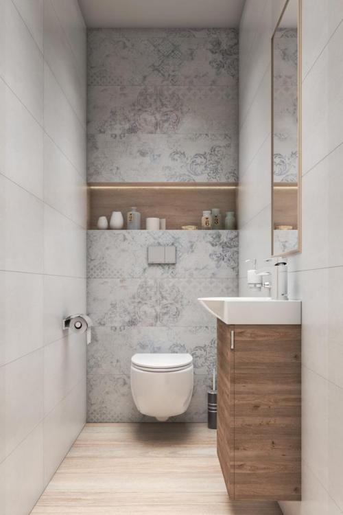 Стены в туалете дешево. Укладка плитки на стены в туалете