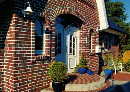 Облицовка дома из пенобетона клинкерным кирпичем. Облицовка кирпичом