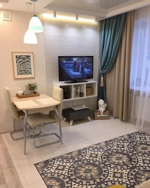 Очень симпатичная кухня и гостиная одновременно. 01