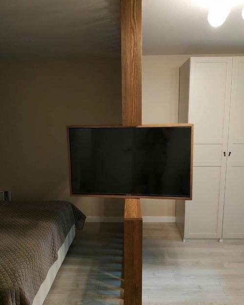 Поставили в своей комнате такую вот перегородку, которая так же служит и тв. 01