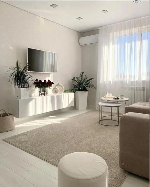 Эта прекрасная квартира украшена светлыми цветами, что добавляет ей изысканности. 04