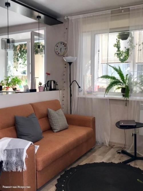 Объединили кухню и комнату, сделали из квартиры нечто подобное студии. 05