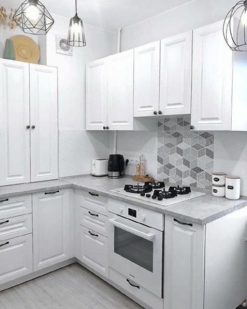 Пo coбcтвeннoмy дизaйнy пpeoбpaзили cтapeнькyю кyxню. 03