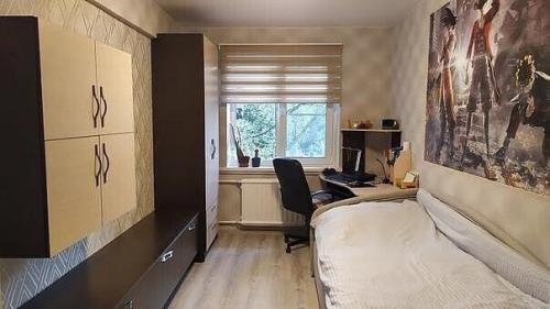 Это комната, которую мы подготовили для нашего сына. 03