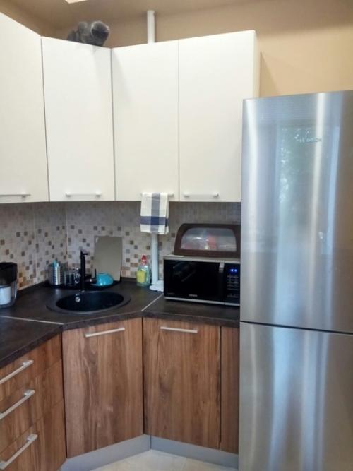 Какая прекрасная кухня получилась, всё симпатично, со вкусом, и главное ничего лишнего. 05