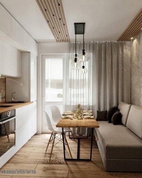 Шикарная и просторная кухня, с большом обеденной зоной для всей семьи. 01