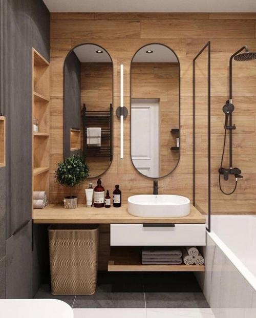 Совмещенный санузел, сделанный в современном стиле с помощью дизайнеров.