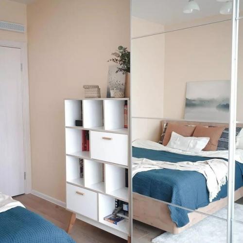 В этой квартире прекрасно дополняют друг друга спокойные, тонко насыщенные цвета. 06