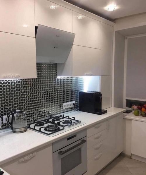 Нами был проведён ремонт нашей кухни. 06