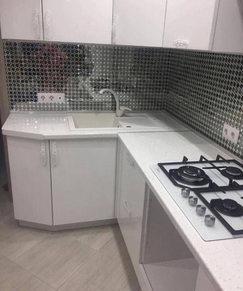 Нами был проведён ремонт нашей кухни. 04