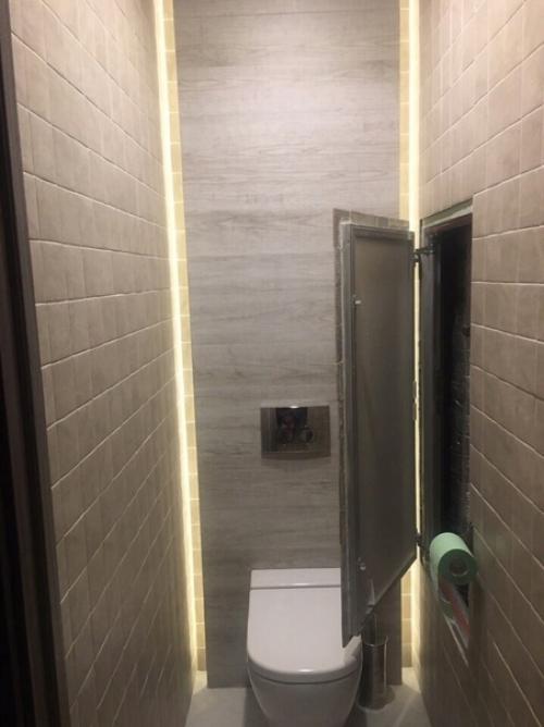 Таким образом мы спрятали все коммуникации в туалете и сделали потайные полочки. 03