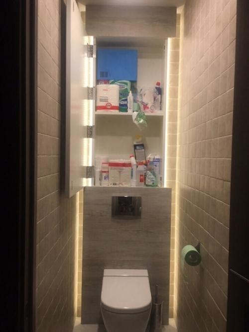 Таким образом мы спрятали все коммуникации в туалете и сделали потайные полочки. 02