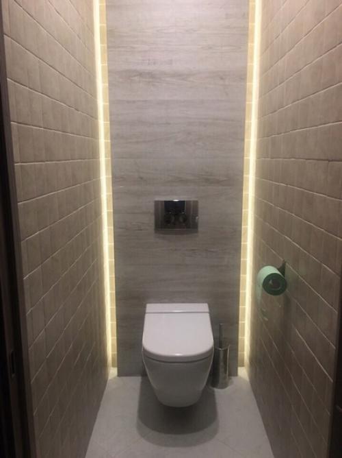 Таким образом мы спрятали все коммуникации в туалете и сделали потайные полочки. 05