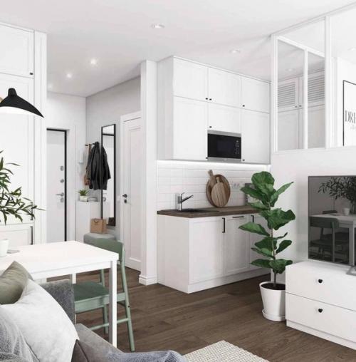 В квартире просторно и светло, акценты зеленого цвета добавляют ей уют и свежесть. 02