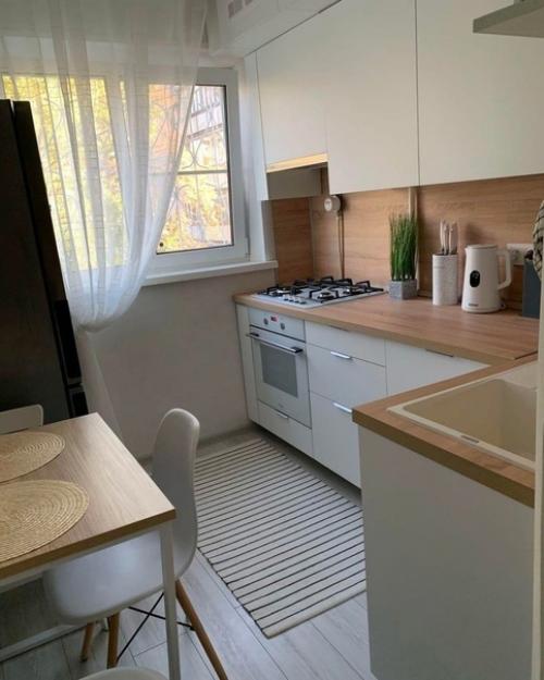 Реконструирование кухни с небольшой площадью стало идеальным решением. 01