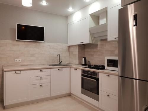 Как же я рада, что ремонт наконец закончился, такой дизайн приобрела наша кухня. 01