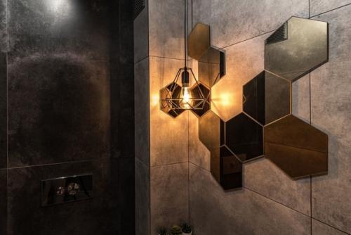 Туалет оформили серой плиткой под цемент. 02