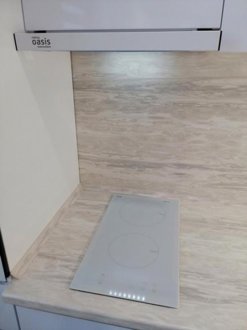 Мы объединили кухню с комнатой, демонтировав для этого стену. 05