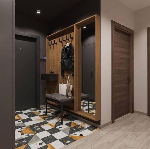 В данной квартире сочетаются современные элементы и простота. 06