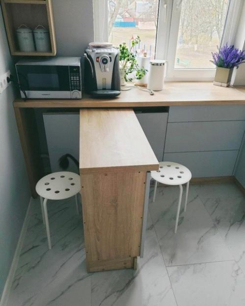 Несмотря на небольшую площадь в 7 квадратных метров, кухня продумана максимально грамотно. 03