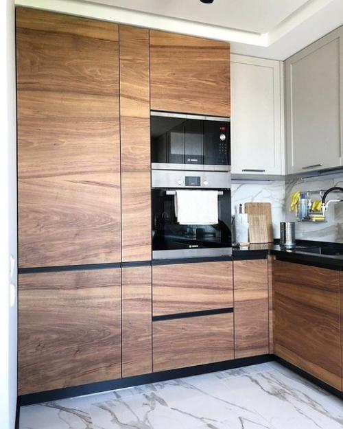 Кухня без всего лишнего, все спрятано и не создает нагромождений. 03