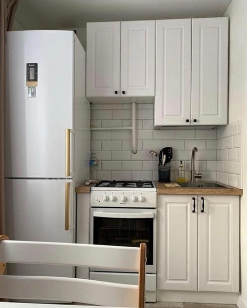 Ремонт кухни 6, 7 м 2 с необычной, но удивительно хорошо спроектированной планировкой - это просто прекрасный вид. 03