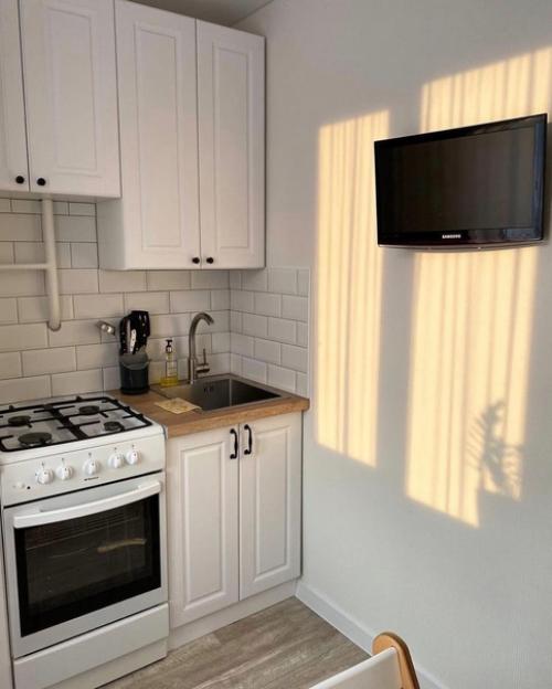 Ремонт кухни 6, 7 м 2 с необычной, но удивительно хорошо спроектированной планировкой - это просто прекрасный вид. 04