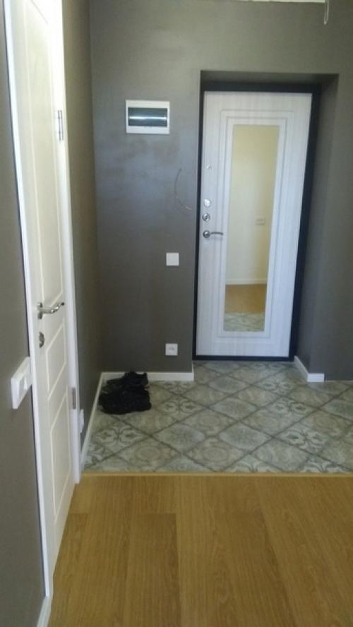 Мы долго все ломали, затем столько же выносили весь мусор, чтобы получить по итогу цивильную квартиру. 07