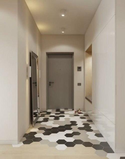 Несколько кадров о том, как я делал полы в коридоре, решили объединить плитку с ламинатом. 01