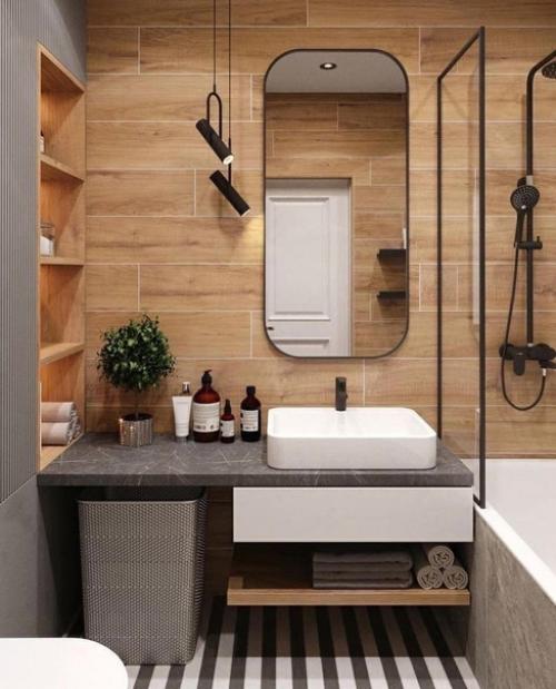 Лишь в том случае, если посмотреть с одной стороны, то очень простая ванная комната, но так же само очень стильная и современная! 02