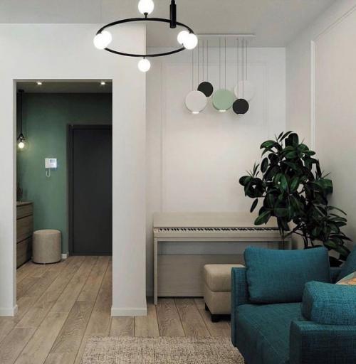 Симпатичный ремонт однушки с красивым акцентом на тёмно-зеленый цвет. 04