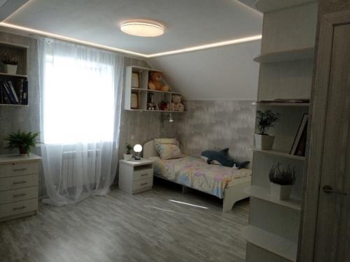 У нас долгое время пустовал чердак, пока мы не решили сделать там комнату для своего сына.